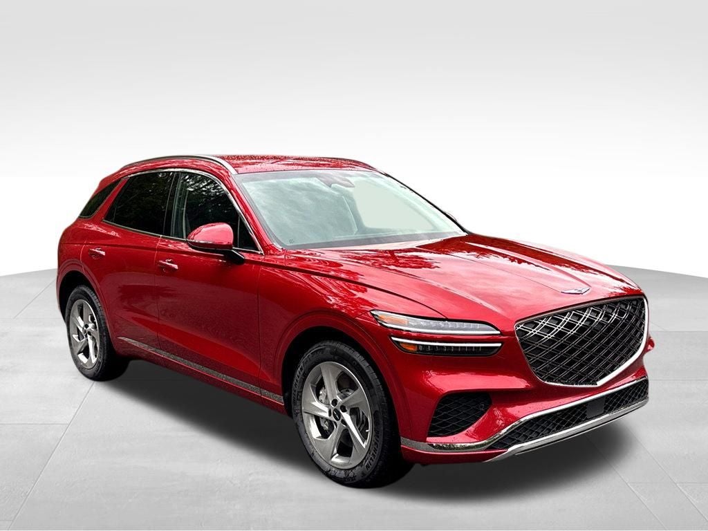 2026 Genesis GV70 2.5T in Mauna Red — front three-quarter view