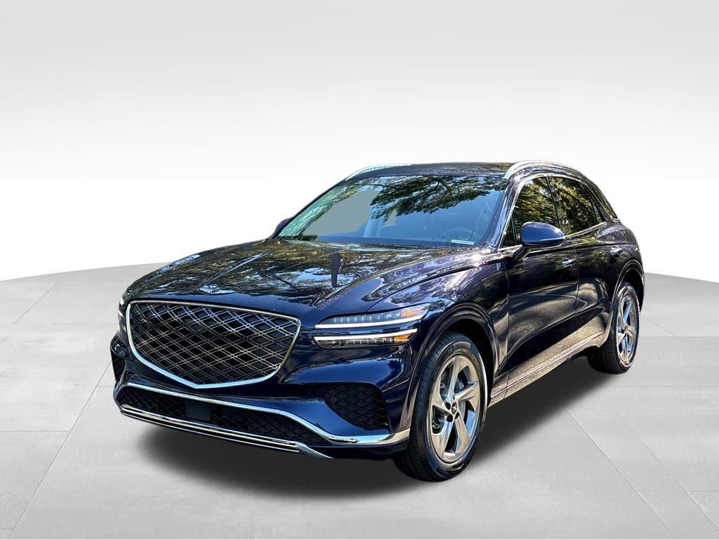 2026 Genesis GV70 2.5T Sport Prestige in Capri Blue — front three-quarter view